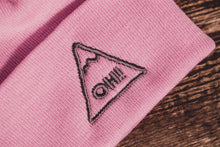 Close up of Grey triangle logo with OH! embroidered in the centre